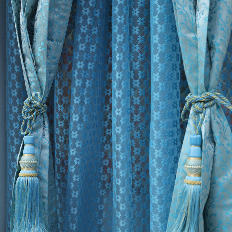 Luxurious Blue Jacquard Curtains with Decorative Tassel Tiebacks