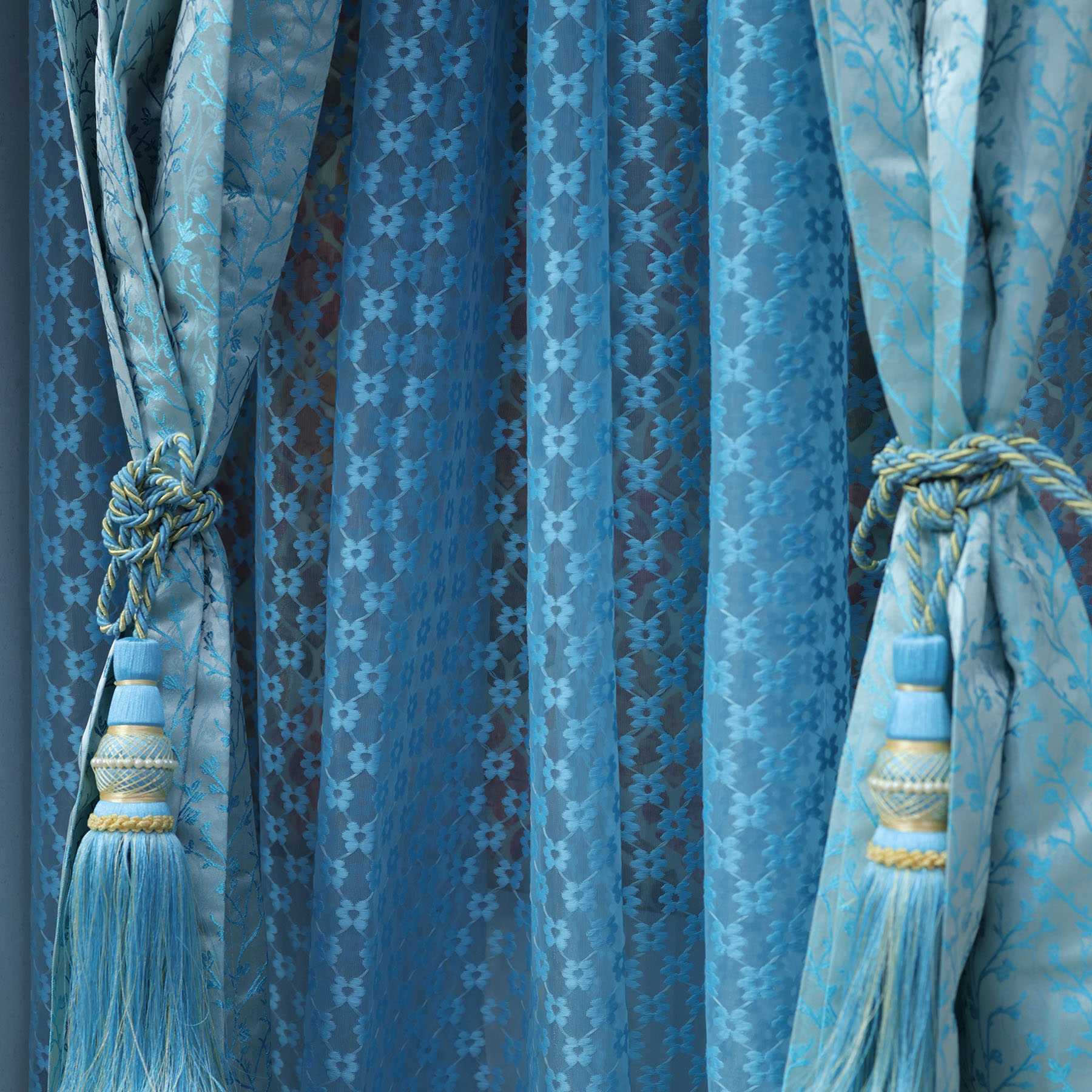 Luxurious Blue Jacquard Curtains with Decorative Tassel Tiebacks
