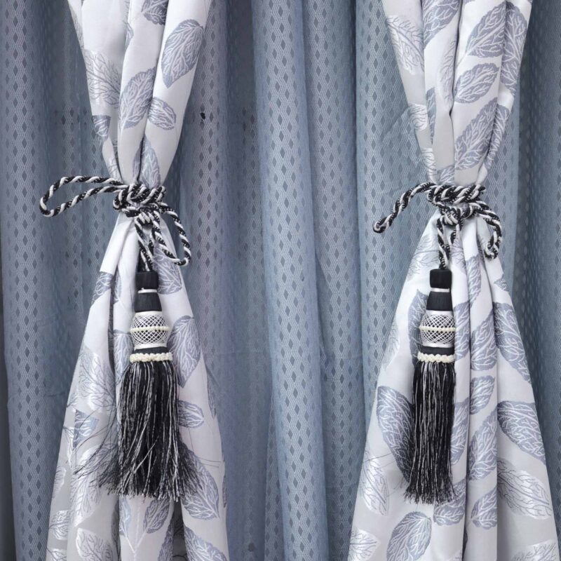 Elegant Silver Jacquard Curtains with Leaf Motif and Black Tassel Tiebacks